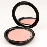 Compact blush with mirror on a white background