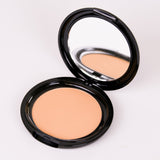Compact powder with mirror on a white background